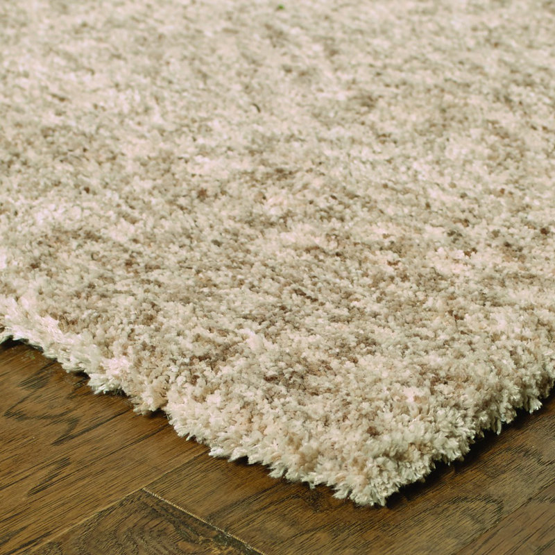 Deryl Solid Colour Machine Made Rectangle 5' x 7' Polyester Area Rug in Tan
