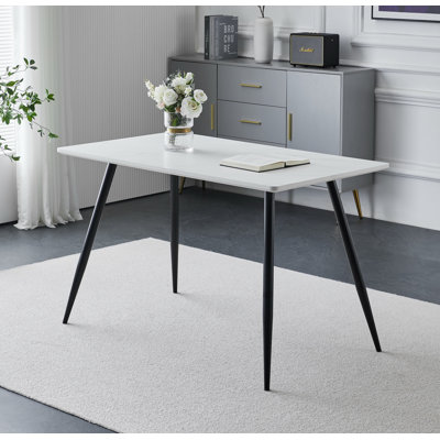 Hinshaw 70" Fixed Table Manufactured Wood Iron Four Leg Dining Table