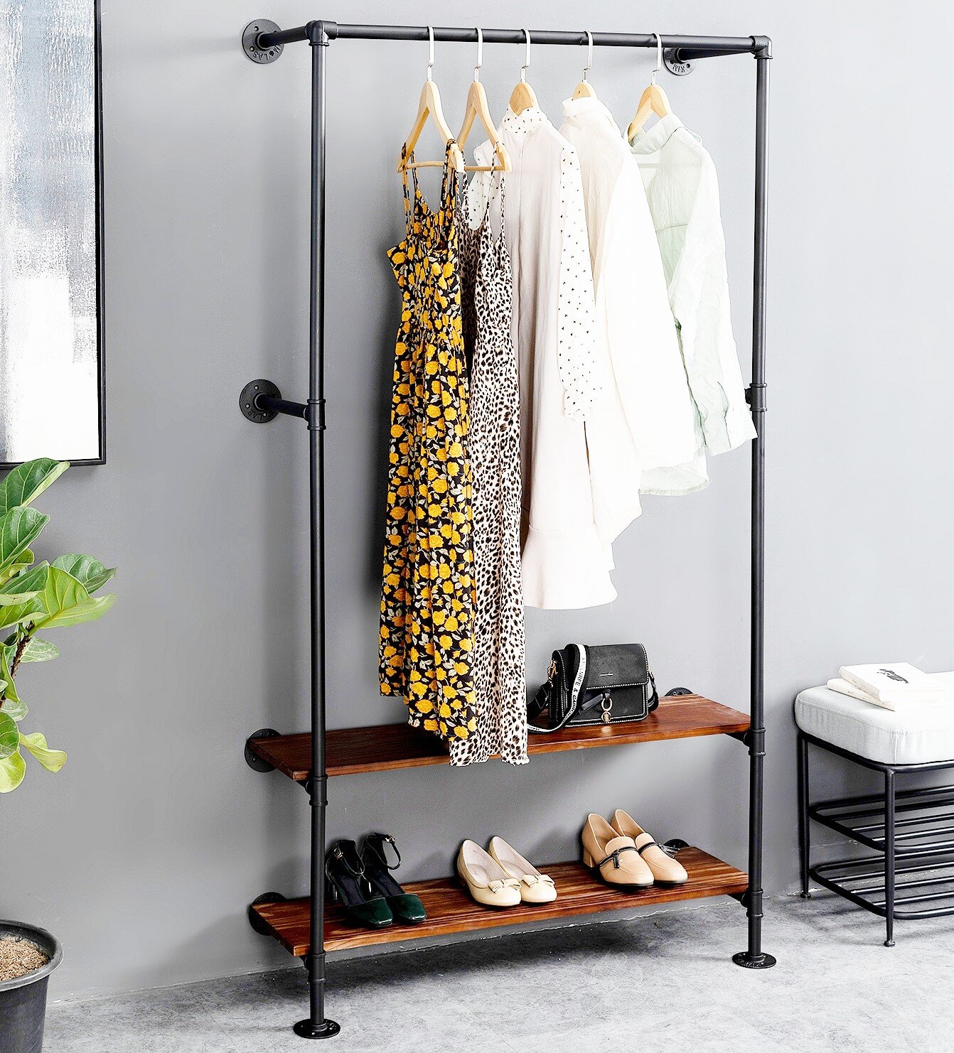 https://assets.wfcdn.com/im/16355757/compr-r85/1842/184288013/aarjav-374-rolling-wall-mounted-clothes-rack.jpg