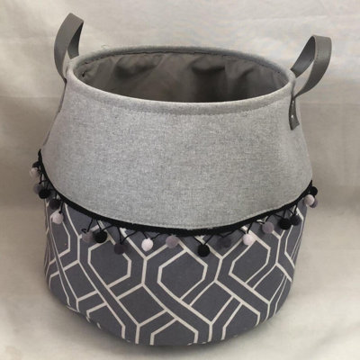 Gray And White Patterned Bottom With Gray Top Handled Fabric Basket