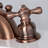 Kingston Brass Victorian Two-Handle 3-Hole Deck Mount Mini-Widespread Bathroom Faucet with Plastic Pop-Up-46501201