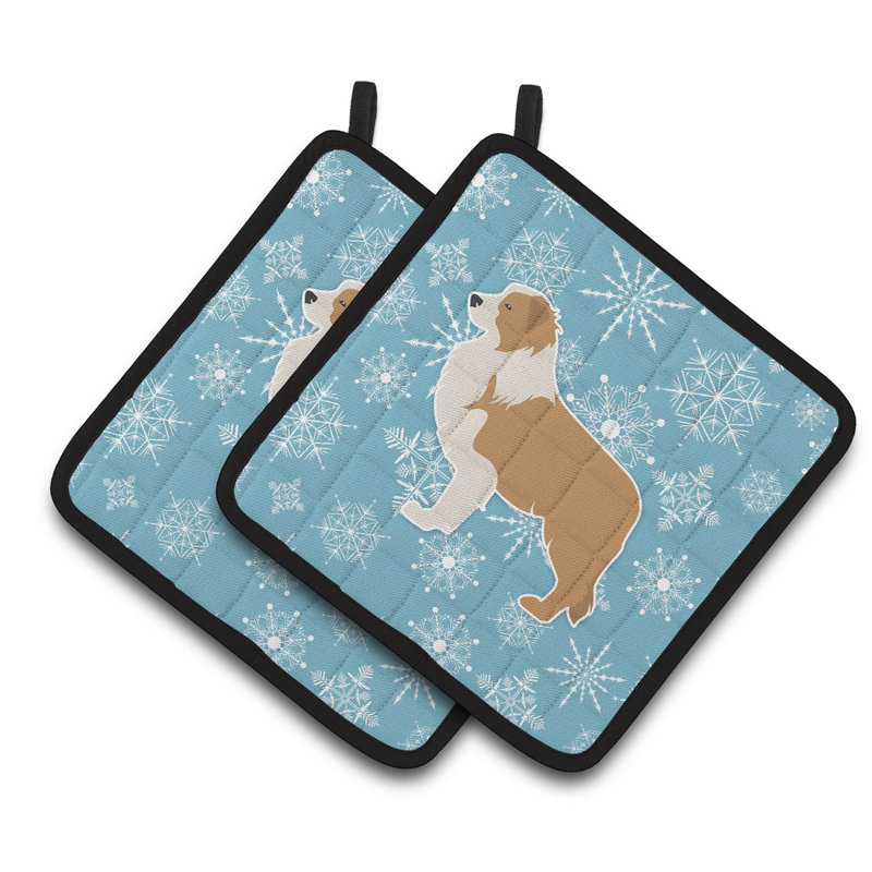 Cuisinier poignée collie bordure en flocons de neige east urban home, Bleu / Beige