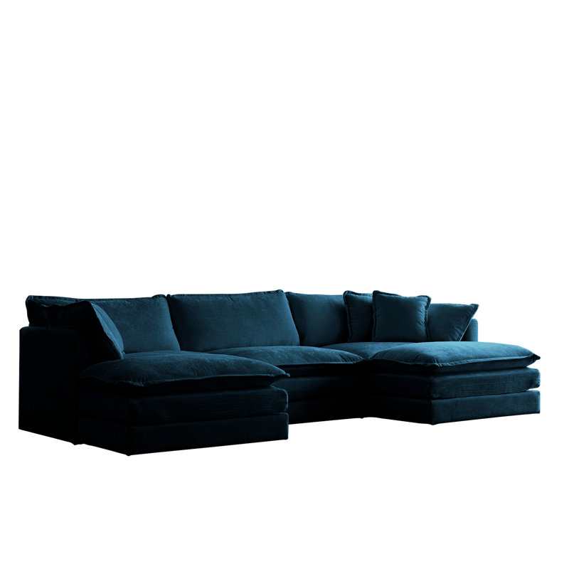 Moderne minimaliste en forme de U, 5 avec 2 repose-pieds, chenille bleue, base en bois massif stable pour la maison modulaire en chenille, encadrant un espace de vie chic