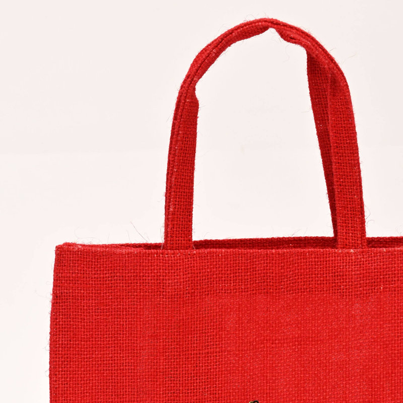 Sac-cadeau de Noël en jute laminée avec motif à paillettes