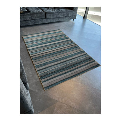 Tapis décoratif moderne bleu à motif abstrait lavable à la machine