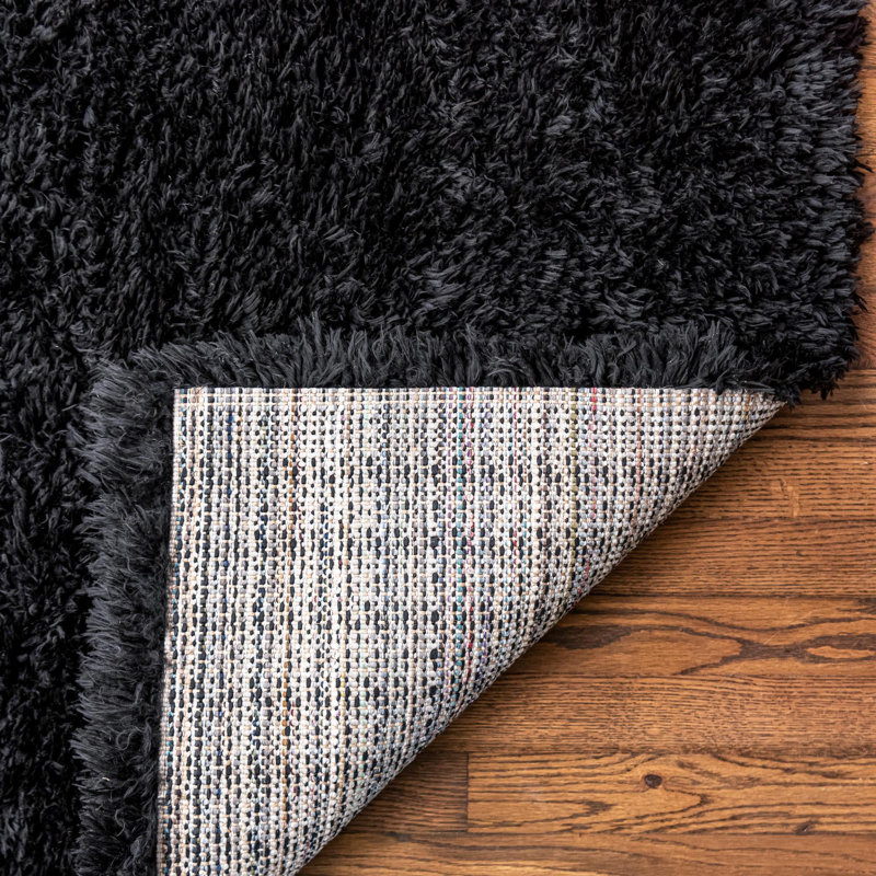 Tapis à poils longs en polyester tissé à la machine de couleur unie Burgy en noir onyx, Rectangle 10 pi x 13 pi