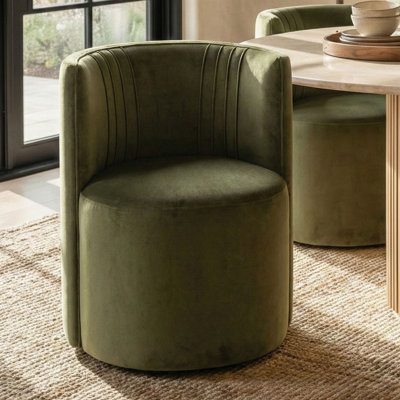 Fauteuil en velours avec roulettes