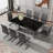 Modern Minimalist Dining Table. The Black Imitation Marble Glass Desktop Is Equipped With Silver Metal Legs