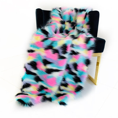 Jeté de luxe en fausse fourrure rose, bleu, noir et jaune Plutus