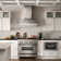 ZLINE 36 in. Designer Series Ducted Wall Mount Range Hood in Satin Steel with Mirror Accents