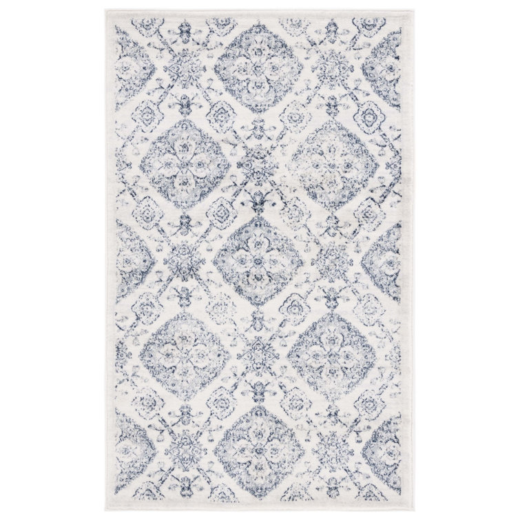 Tapis gris à motif floral Joana