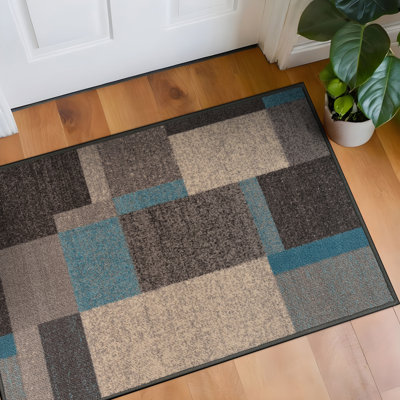 Tapis bleu tissé à la machine Bolk