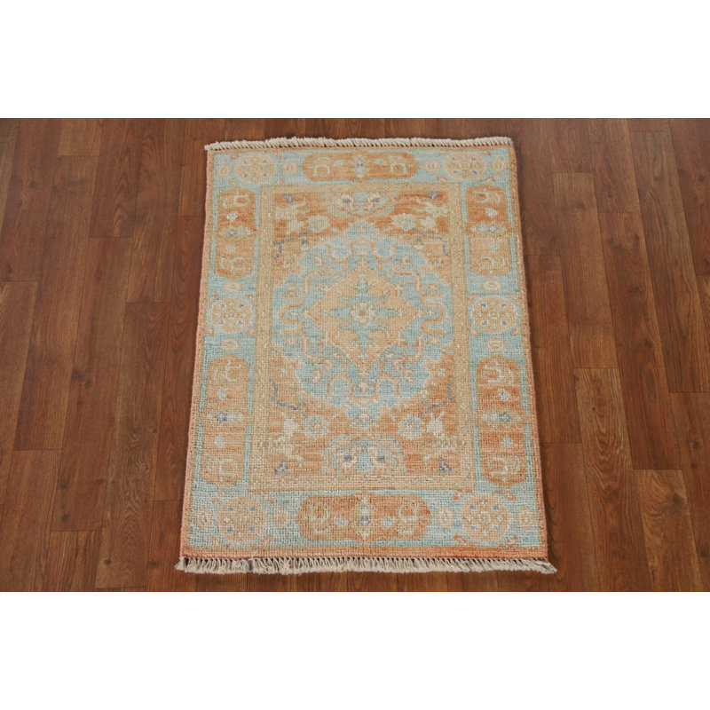 Tapis turquoise et orange Oushak