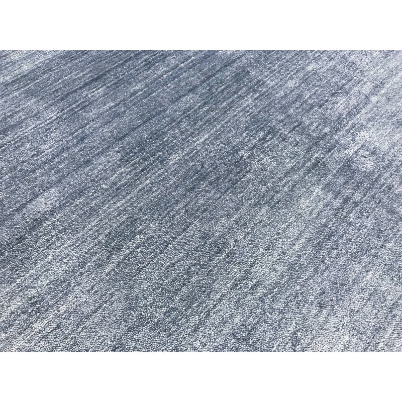 Tapis bleu de haute qualité noué à la main