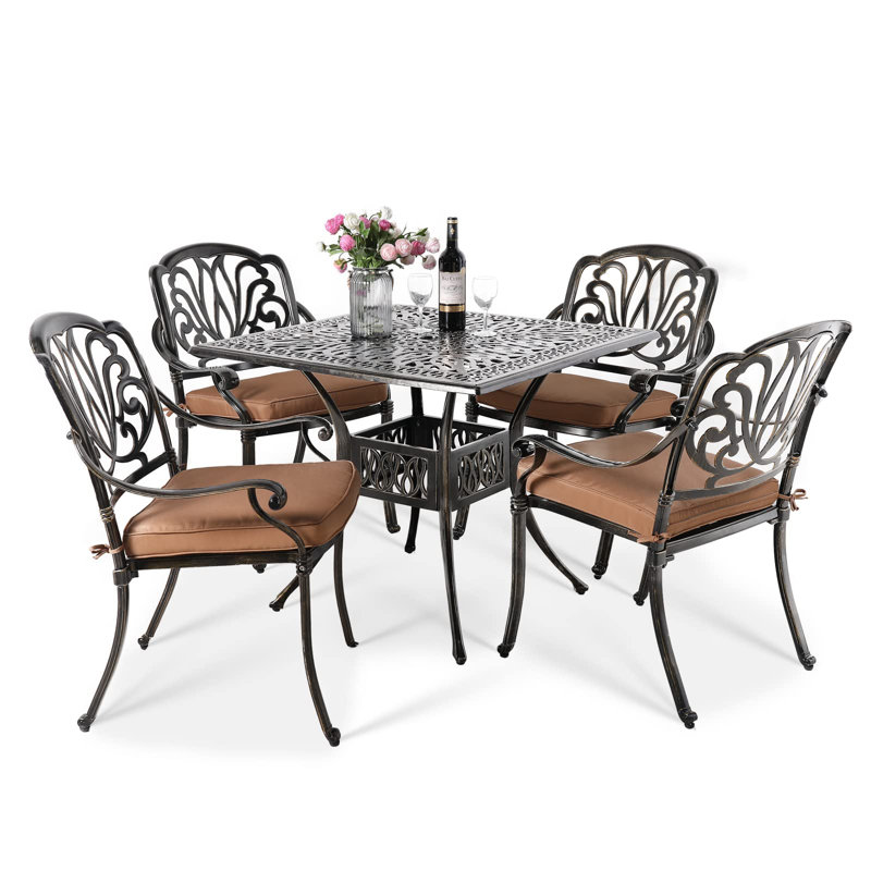 Kolle 4 - Person Patio Dining Set with Square Table , Cushions Included, Khaki/Antique Bronze