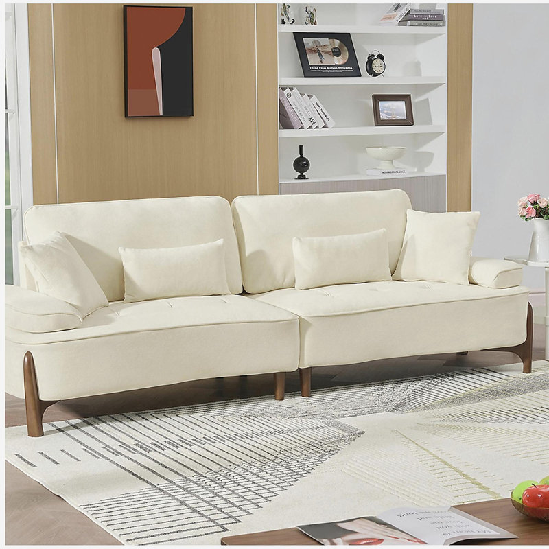 Canapé confortable à assise profonde avec coussin moelleux, idéal pour divers espaces