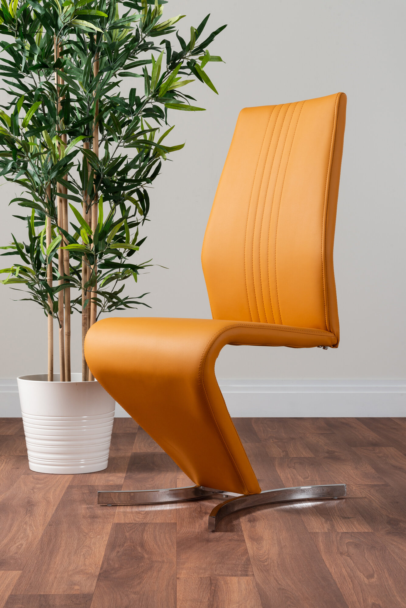 Orange faux deals leather dining chairs