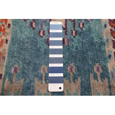 Tapis turquoise Kathmandu 8 pi 6 po x 9 pi 9 po