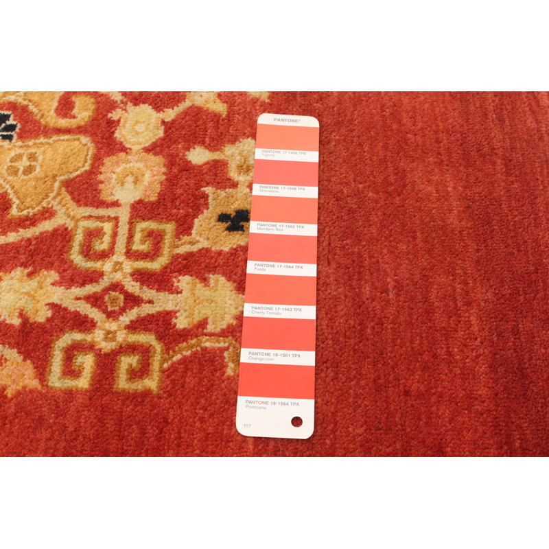 Tapis rouge / orange en laine noué à la main
