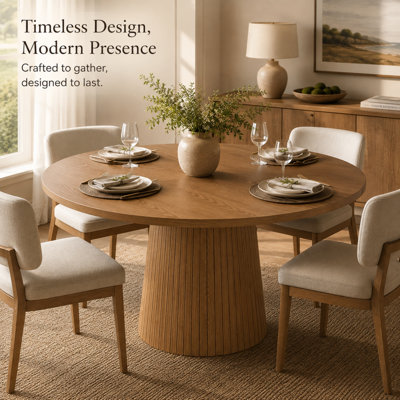 Table de salle à manger ronde Brathwaite 120 cm (47,24 po) pour 4 personnes, style ferme moderne, en MDF avec pied central cannelé.