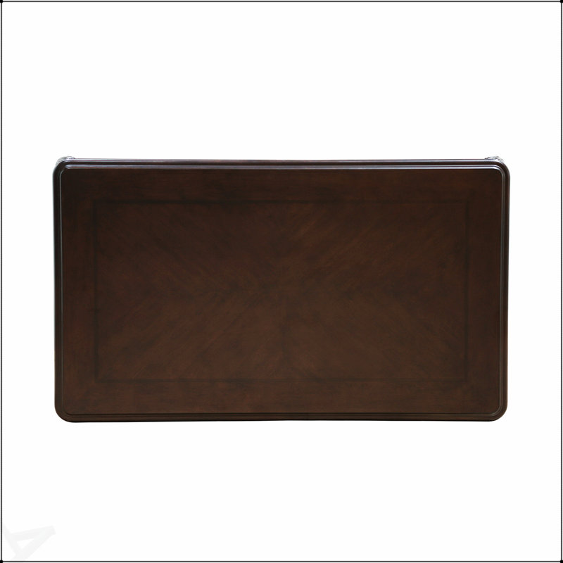 Table basse en bois massif de style traditionnel avec un design finement sculpté et des pieds courbés, parfaite pour les salons élégants