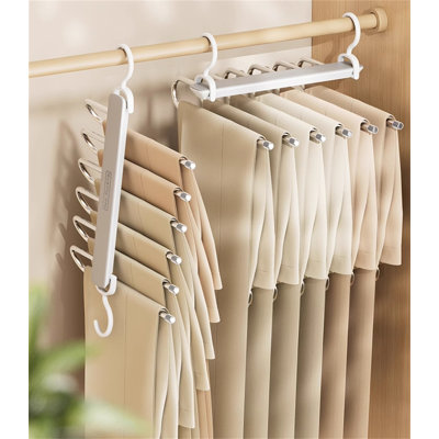 Cintre pour pantalons pliable en acier inoxydable