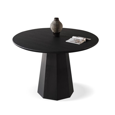 Tables de salle à manger rondes noires en bois massif
