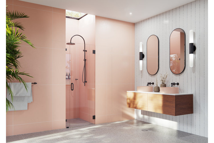 modern bathroom with peach walls and a hinged shower door
