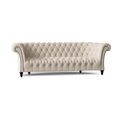 Canapé Chesterfield à accoudoirs roulés