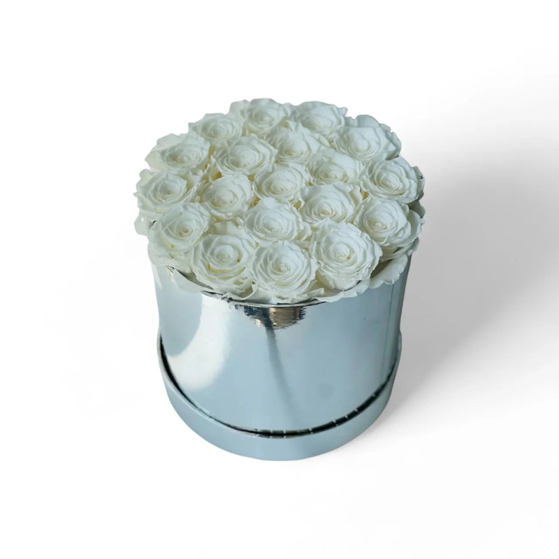Arrangement floral rose en boîte