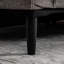 Banc rembourré à l'extrémité du lit-122663270