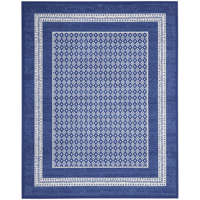Tapis bleu marine en polypropylène tissé à la machine Cauy, Rectangle 7 pi x 10 pi