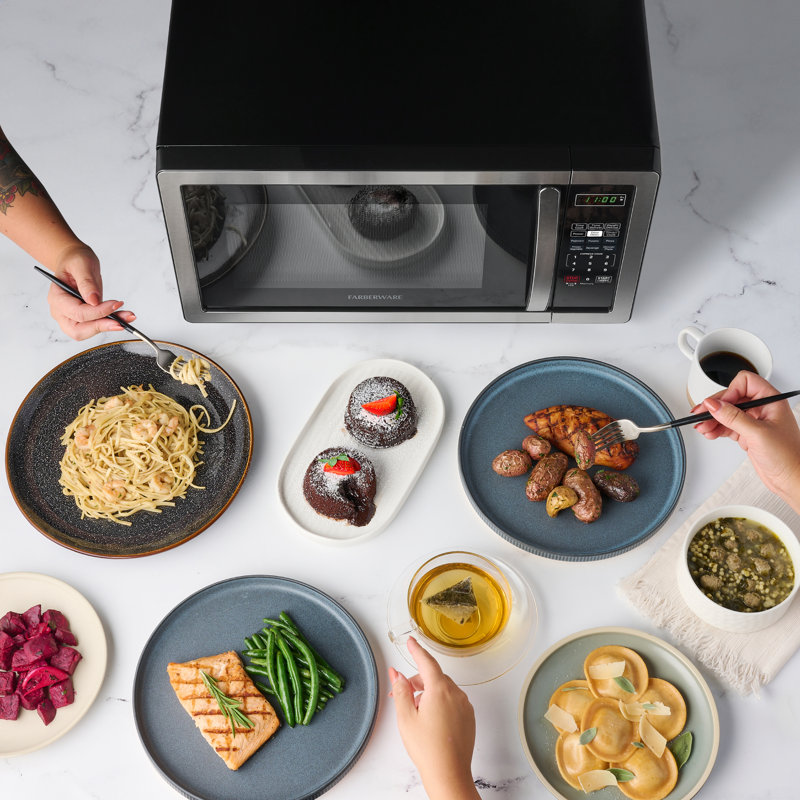 Sleek Stainless Steel 1.1 Cu Ft Countertop Microwave with Child Lock