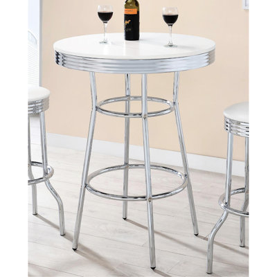 Table de salle à manger ronde blanche brillante, de style moderne, 107 cm de hauteur x 76 cm de largeur, fabriquée avec soin et robustesse. Table de bar idéale pour la cuisine et les repas, dans une ambiance contemporaine. Dimensions : H x L x P. Solide et élégante.