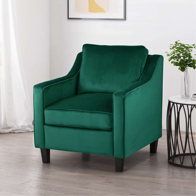 Fauteuil club en velours vert