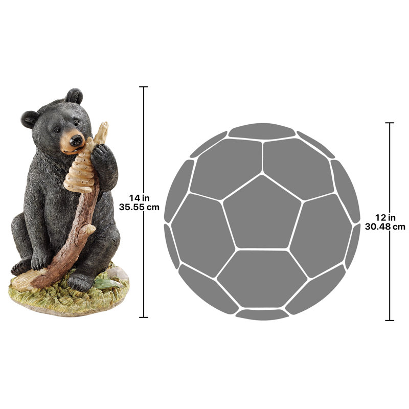 Figurine miel et ours noir curieux