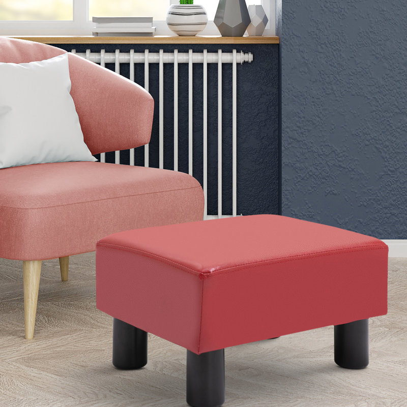 Repose-pieds rouge élégant pour la chambre à coucher, avec rembourrage en mousse et repose-pieds confortable en plastique, base en tissu d'ameublement en similicuir