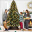 Arbre de Noël artificiel pré-éclairé avec baies et pommes de pin givrées