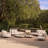 Laguno 129.92'' Wide Curved Patio Sofa with Cushions