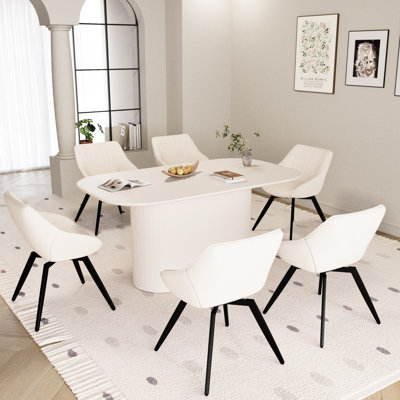Table de salle à manger de 63 po de style médiéval moderne avec 6 chaises pivotantes ergonomiques en métal et un plateau de table en acier inoxydable, idéal pour recevoir des invités