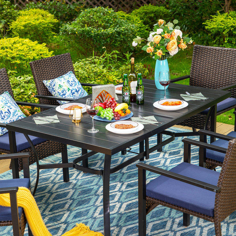 Leonard 6 - Person Patio Dining Set with Rectangular Table , Cushions Included, Sunbrella Beige, Navy Blue