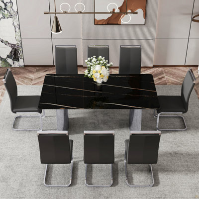 Table and chair set.The table has a glass top with imitation marble pattern stickers and stainless steel silver legs.Paired with 8 Black PU Chairs with Silver C-tube Metal Leg.