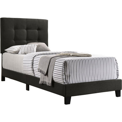 Lit à panneau simple gris anthracite pour un environnement de chambre à coucher tranquille avec style et plateforme basse