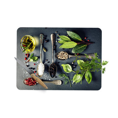 Planche à découper en verre de haute qualité avec un design moderne et élégant d'herbes et d'épices, idéal pour rehausser l'ambiance de toute cuisine