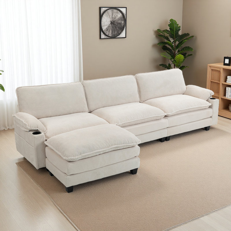 113" Modern 3+1 L-Shaped Corduroy Fabric Sofa,Modular Sectional Cloud Couch W/Ottoman,35D High-Resilience Sponge&Double-Layer Thick Cushion,Cup Holders,Storage Bags,Couches For Living Room,Apartment