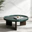 Table basse de style vintage avec plateau noir-vert brillant et pieds en placage chêne blanc