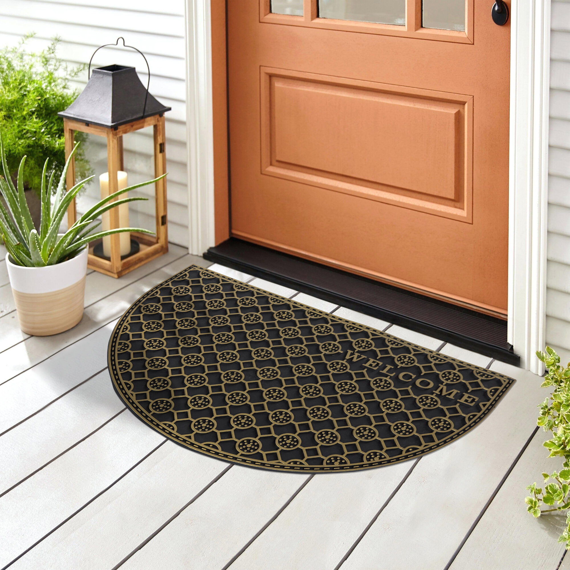 https://assets.wfcdn.com/im/16569389/compr-r85/1879/187955507/ottomanson-heavy-duty-all-season-comb-welcome-design-doormat-black-18-x-28.jpg