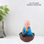 Figurine de moine en mouvement musical-377625361