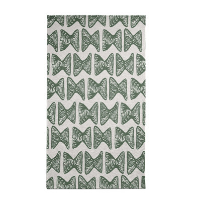 Tapis à motif géométrique vert