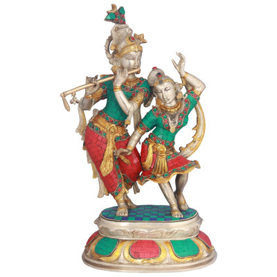Radha et Krishna engagés dans la danse